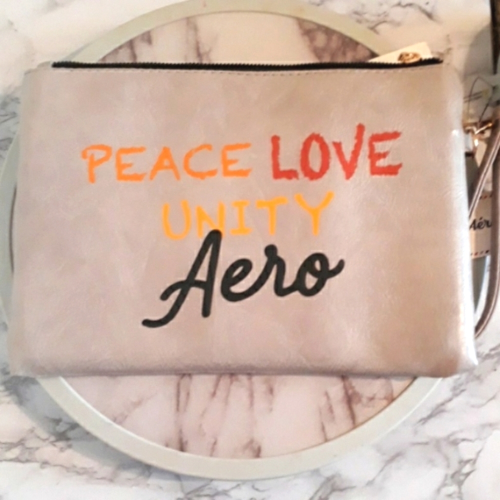 Aeropostle Peace Love Unity Wristlet‎